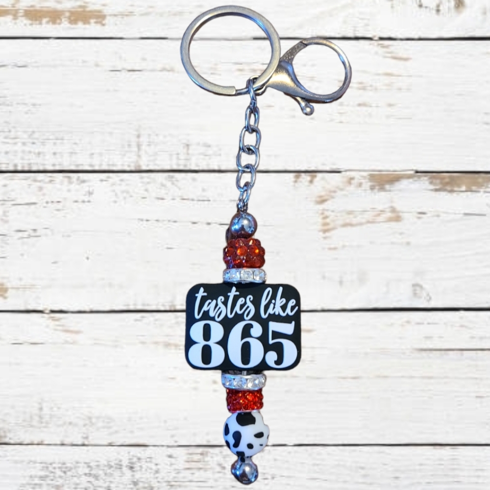 Tastes Like 865 Cow Print Beaded Keychain